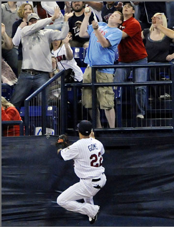 (Jim Mone/AP) Great hand(s) by the fan in blue while Nick Lachey shields his eyes
